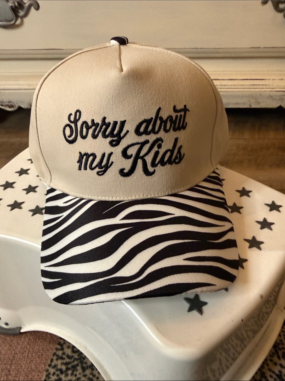 Beige Trucker Hat with 'Sorry about my Kids' Embroidery and Zebra Print Bill